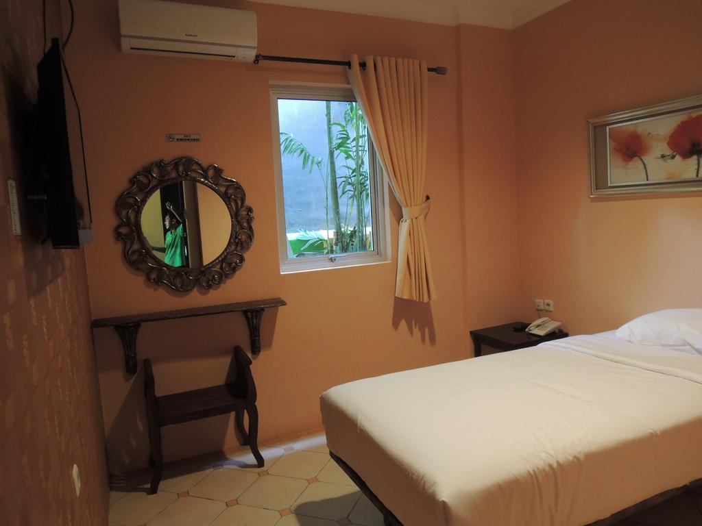 Twins Hotel Jakarta Pokoj fotografie